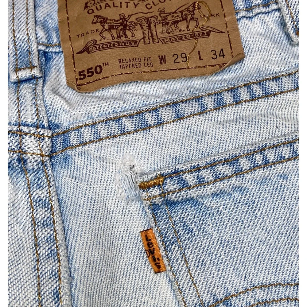 Vintage Levi's 550 Orange Tab Jeans 29x34 Light Blue Relaxed Tapered